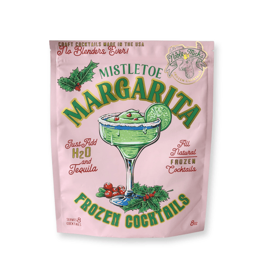 A pink pouch labeled Frozen Cranberry Mistletoe Margarita with a drawing of a margarita glass, lime, and holly. Just add water and tequila for party drinks made with all-natural ingredients—serves eight.